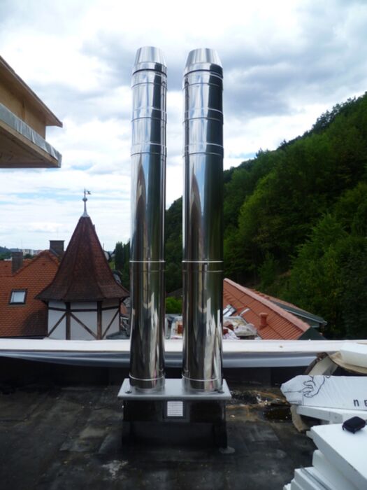 Mehrfamilienhaus - AHRENS CIE mit ACEV Schornsteinverlängerung