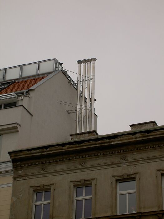 Wohnhaus - Kaminhochführungen mit Aufsätzen